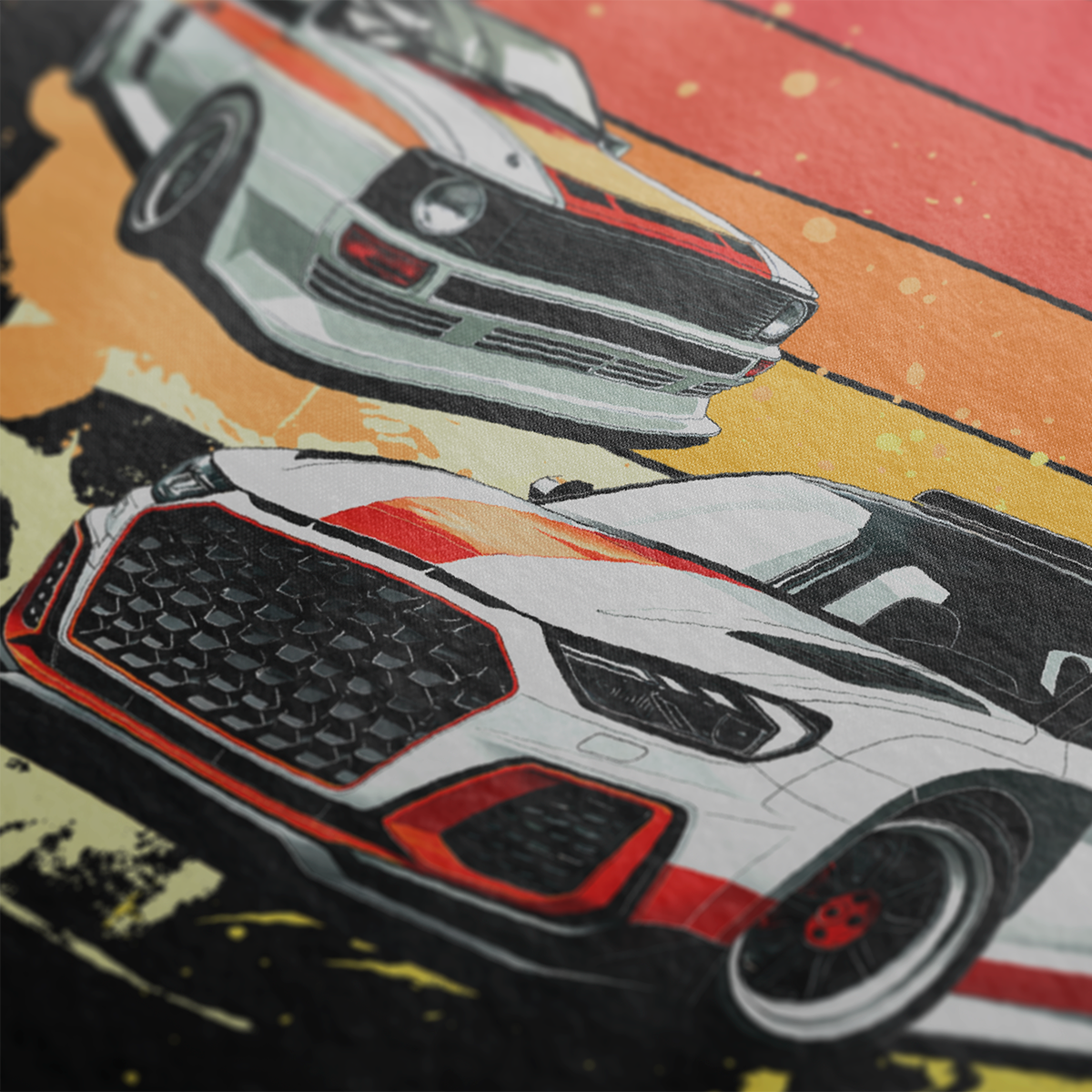 Close up of Racing Sport Rally Sunset Automotive Graphic T-Shirt Design – unisex tee featuring a rally car and a vintage car against a bold sunset background in shades of red, orange, and yellow. Ideal gift for car and motorsport enthusiasts.