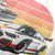 Close up of Racing Sport Rally Sunset Automotive Graphic T-Shirt Design – White unisex tee featuring a rally car and a vintage car against a bold sunset background in shades of red, orange, and yellow. Ideal gift for car and motorsport enthusiasts.